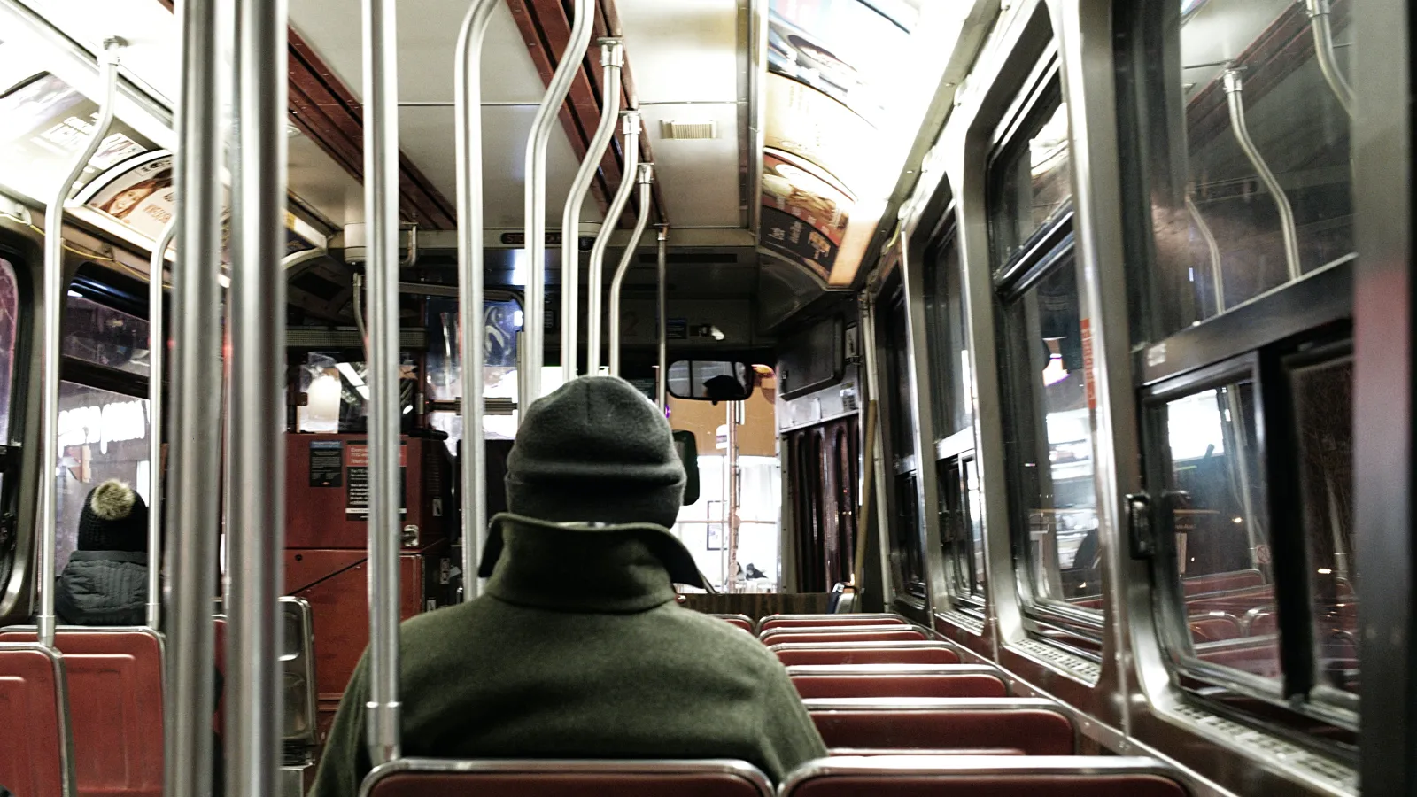 Person sitting on bus 